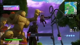 Plant a seed on a heart shaped island as Groot and Emote as Groot at a Friendship Monument