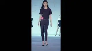 Model loses one of her high heels and walks with only one shoe on during a Chinese Fashion Show