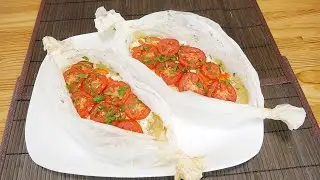 Chicken baked with vegetables and sour cream sauce