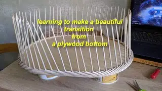 Beautiful transition from the plywood bottom to the walls of the basket, paper weaving
