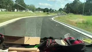 Neil driving box truck on private farm. 