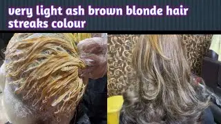 Very light ash brown blonde streaks on henna treated hairs