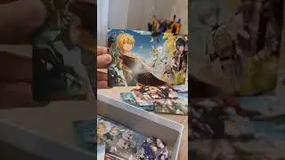 распаковка подарочного набора Genshin impact
