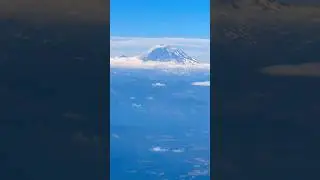 Mesmerizing Sight: Mount Rainier Piercing Through the Clouds. #beautiful #views