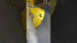 Working with gold leaf.