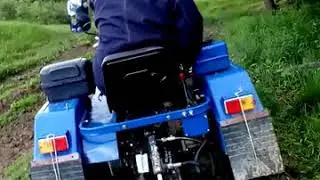 Минитрактор  Русич  т-240. Обкатка  прицепа  .Чуть  по  буксовали !