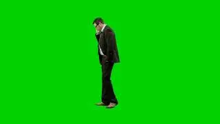 Business man walking on green screen