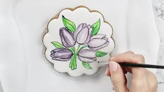 Painting purple tulips on a Gingerbread cookie - Satisfying Dessert Decoration