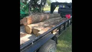 Unloading Logs with the Iron Fist #sawmill #artillian #tractor