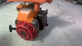 A Ural chainsaw from the USSR with a headlight and ignition from a scooter. Experiment No. 1