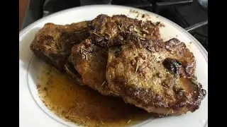 How to make Delicious pork chops in garlic champagne sauce.