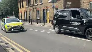 Police car Responding ￼ in ￼ Bethnal Green ￼