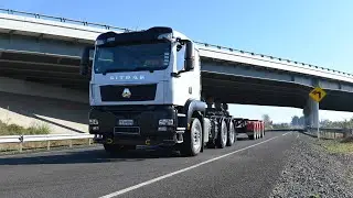 Sinotruk 2022 C7H 6X4 Tractor Unit & 2019 Roadmaster Quad Skeletal Trailer