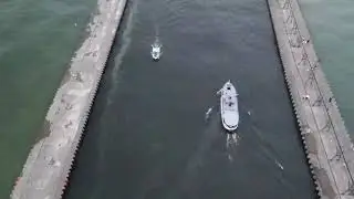 Following small steam ship up the South Haven channel
