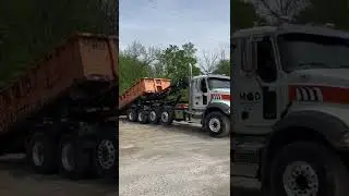 Picking up a 20 cubic yard roll-off dumpster with 2020 Mack Granite