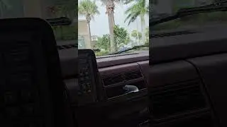 Lady tries to grab the spot. then backs into a small pole