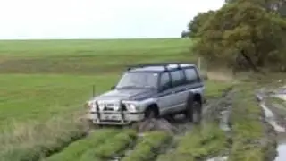 rb30 nissan patrol gq in mud hole