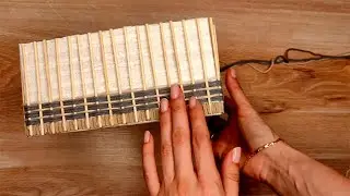 Super beautiful DIY organizer made from an old box and yarn