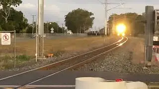 Pacific National PN002 coming past Avenell Heights in Bundaberg.