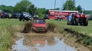 Jeep Wrangler TJ on 33s with 4" Skyjacker lift in mud pit at the Steinjäger Jeep Blitz