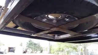 Under Trailer spare tire carrier.