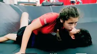 Little girl vs boy wrestling 