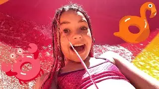 Red water slide in the water park 
