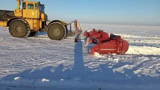 Snow retention in the fields 2022. K-744 and K-700 with new snow plows.