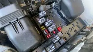Where is the Engine Fuse box on a Ford Fusion?