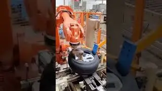 Robot assembling tires on rims