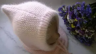 A BEAUTIFUL, COMFORTABLE HOOD WITH A PEARL PATTERN MADE OF MINK DOWN YARN.
