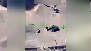 US Military Reaper Drone footage of a Metallic Orb UFO in Middle East (Declassified Video)