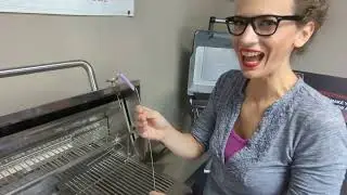 What In The Grill!? That Thing Hanging On A Chain From Your Grill Is a Match Holder
