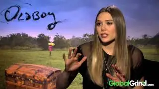Elizabeth Olsen Doesn't Have Pictures Of Black People On Her Wall