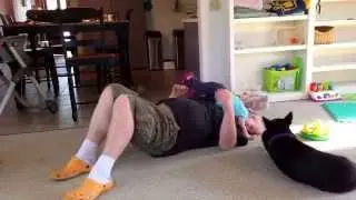 Climbing on grandpa.