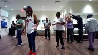 K-SQUAD learns Tucker at Oak Street Health linedance class