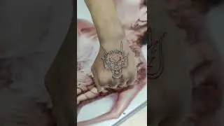 тату дракон на кисти
