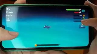 Играю в игру Hungry shark evolution. Открыл новую акулу. Забираю свои награды.