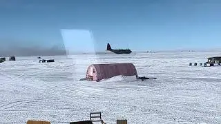 C-130 Hercules ski aircraft taxiing at East Greenland Ice Core Project field camp, Greenland