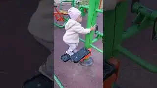 Тася на детской площадке
