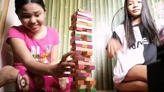 Playing Jengga with my bff Aivy pagsinohin