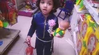 Kid Shopping at the supermarket eliza