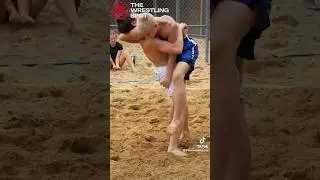 Jace Glauser body locks Evan Glowinski to the sand for one