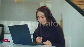 Asian Student Listening Online Free Audio Course | Stock Footage - Envato elements