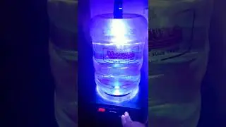 It's a water cooler light show! 🔦🫧😲🤯 #shiny #hypnotic #bubbles #iloveflashlights