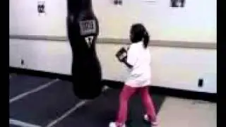 Mama hitting the heavy bag