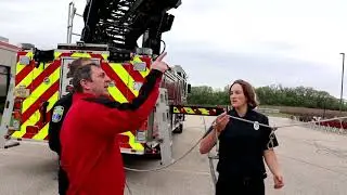 Fire trucks hanging the flag