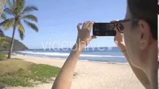 Taking Pictures on the Beach - Stock Footage