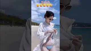 Trending Cameltoe Girl Steals the Spotlight! 🔥🏖️ 