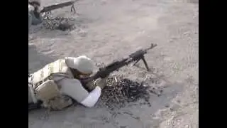 firing the M240 machine gun